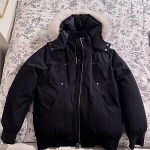 Moose Knuckles Black Puffer Jacket with White Fur Hood